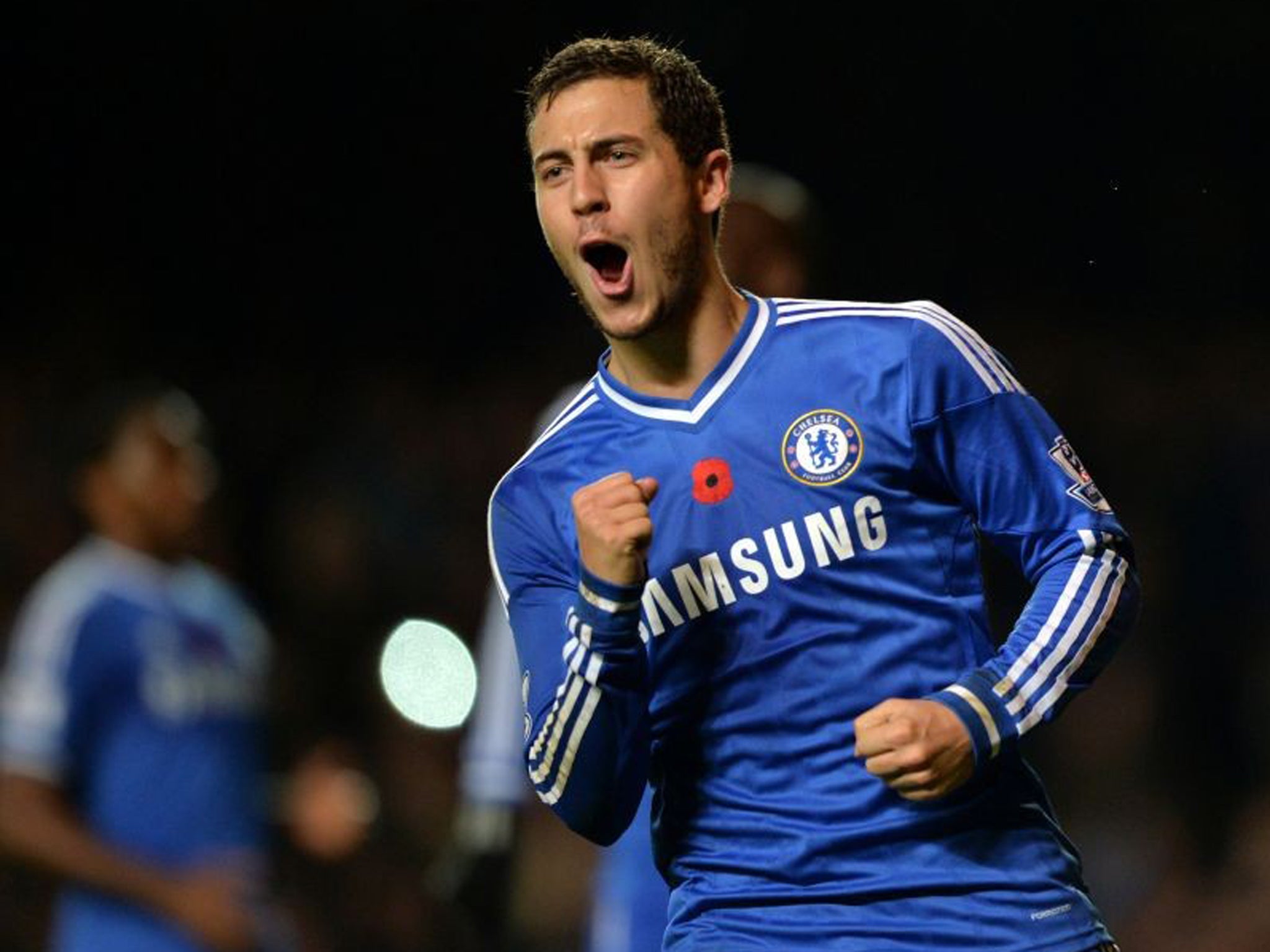 Eden Hazard celebrates scoring his penalty