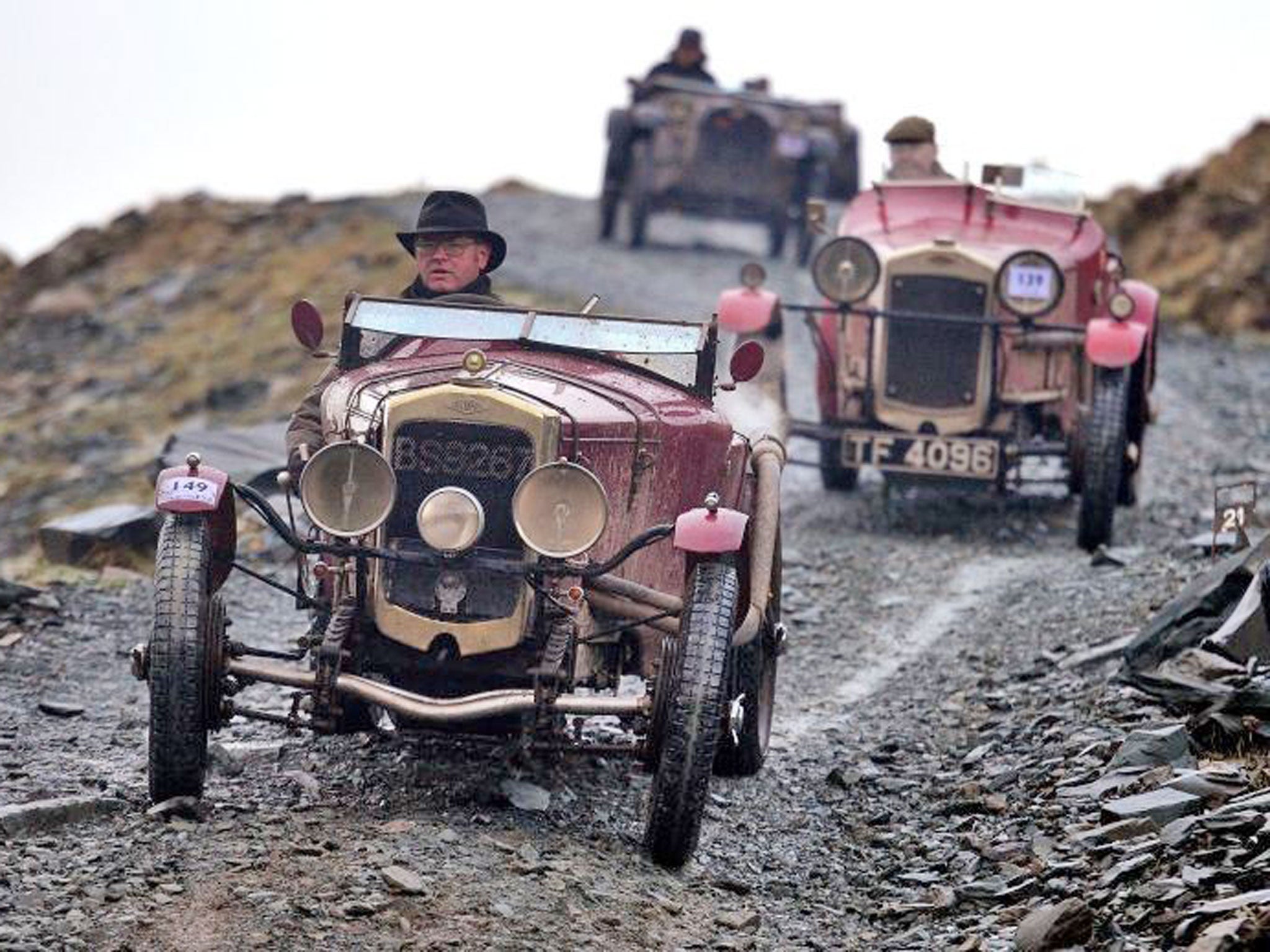 Over 100 vintage vehicles scaled Fleetwith Pike in Cumbria in adverse weather conditions