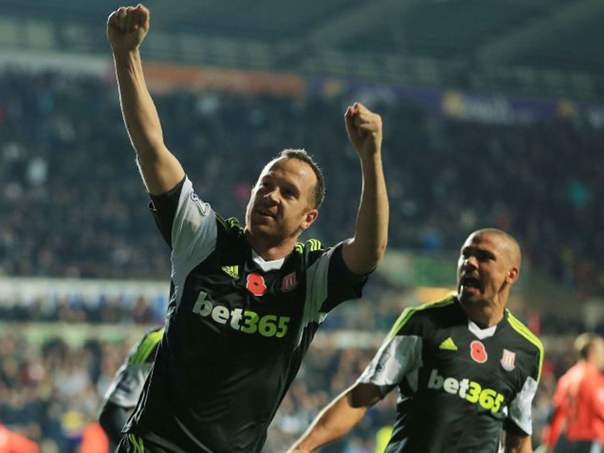 Charlie Adam celebrates his dramatic injury-time penalty against Swansea