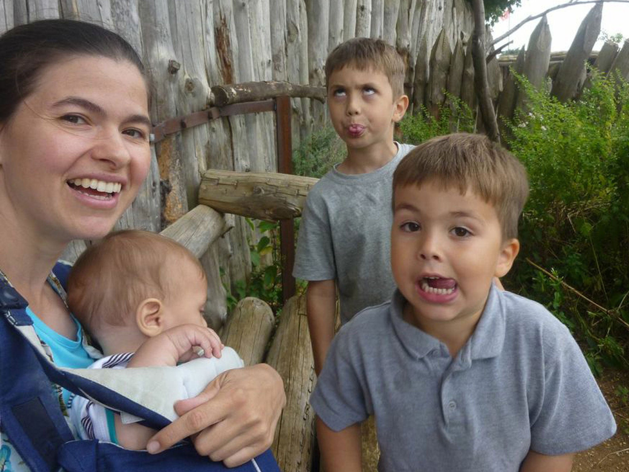 Rachael Neustadt with her children, from left, Meir, Jonathan and Daniel