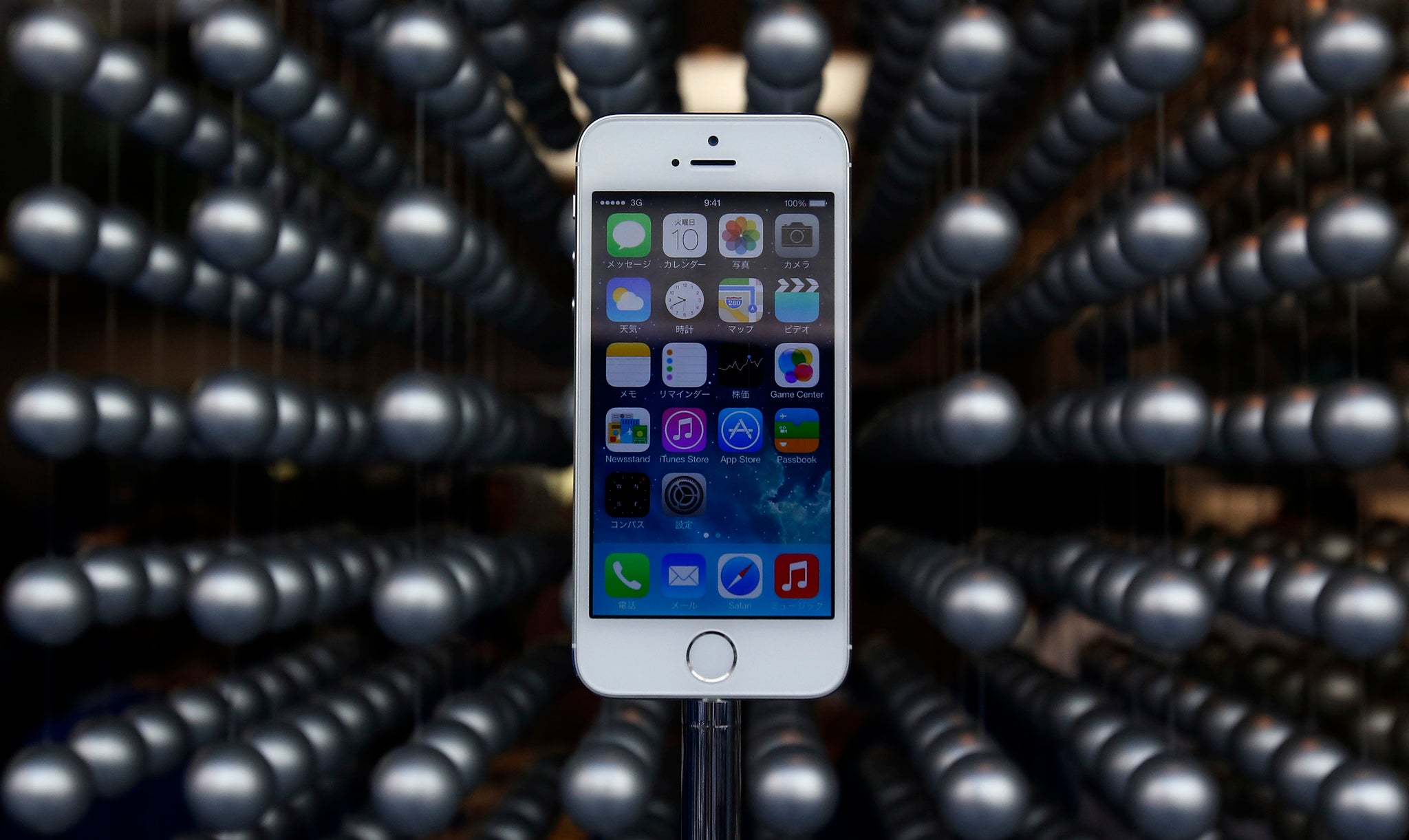 Apple's new iPhone 5S is displayed at an Apple shop in Tokyo's Ginza shopping district, September 20, 2013