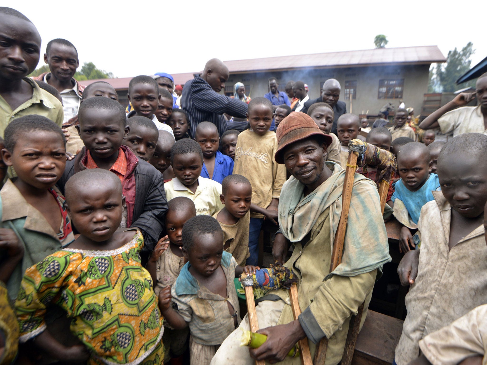 Internally displaced people gather at the Mbuzi hilltop near Rutshuru