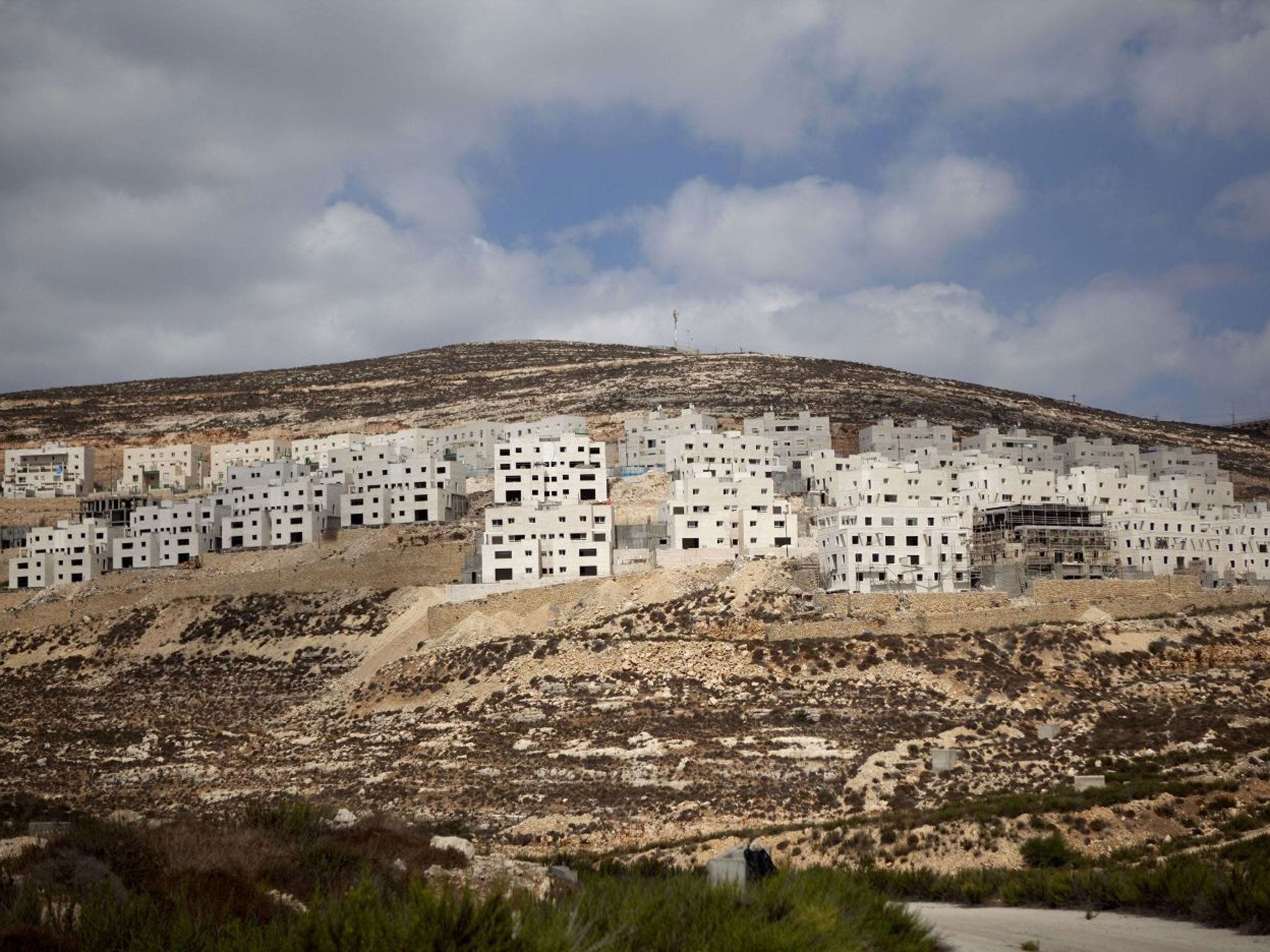 File: A picture taken on 13 September 13 2010 shows then-new construction in the Jewish settlement of Givat Zeev in the West Bank, north of Jerusalem.