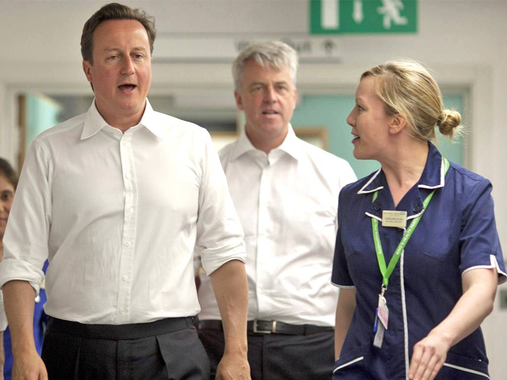 David Cameron in 2009 said, 'With the Conservatives there will be no more of the tiresome, meddlesome, top-down restructures that have dominated the last decade of the NHS'. Andrew Lansley (centre) went on to launch one of the largest reorganisations in NHS history