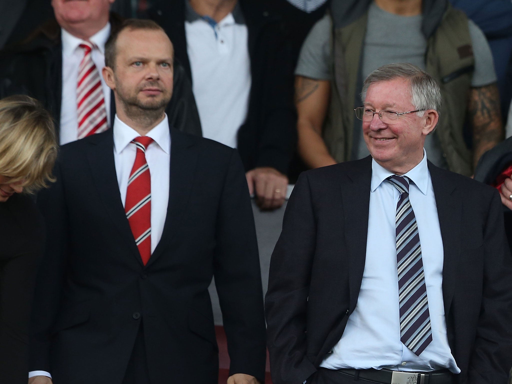 Manchester United executive vice-chairman Ed Woodward stands alongside former manager Sir Alex Ferguson