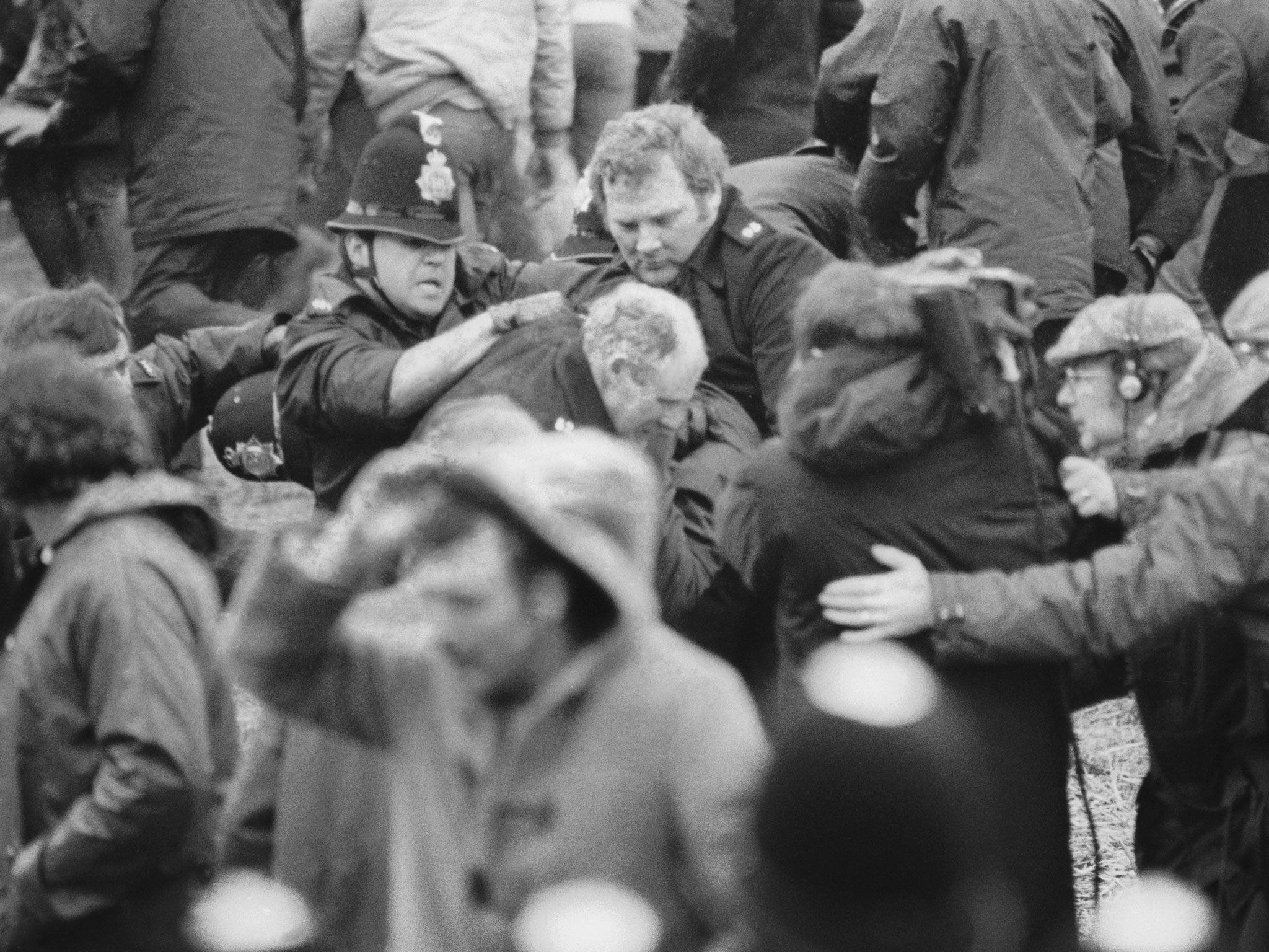 A camera crew fims a scuffle between police and miners at a demonstration at Orgreave Colliery, South Yorkshire, during the miner's strike, 2nd June 1984 - All police forces in England and Wales have been asked to search their files over claims that officers altered witness statements