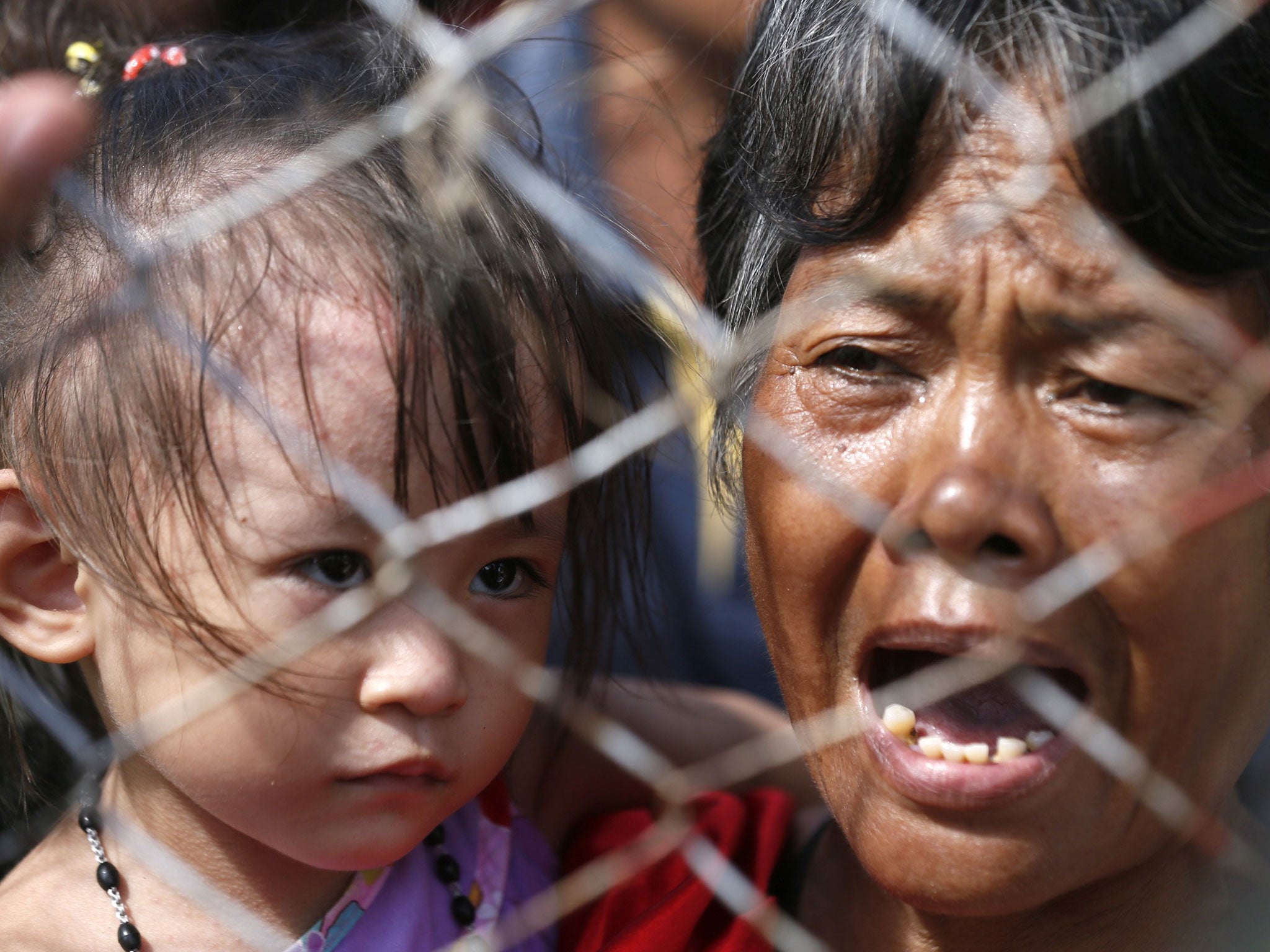 Survivors wait to be airlifted to Manila