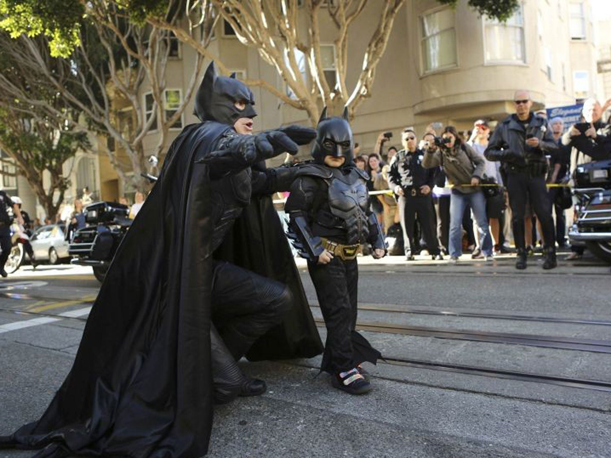 Batkid Miles prepares to rescue a woman in distress