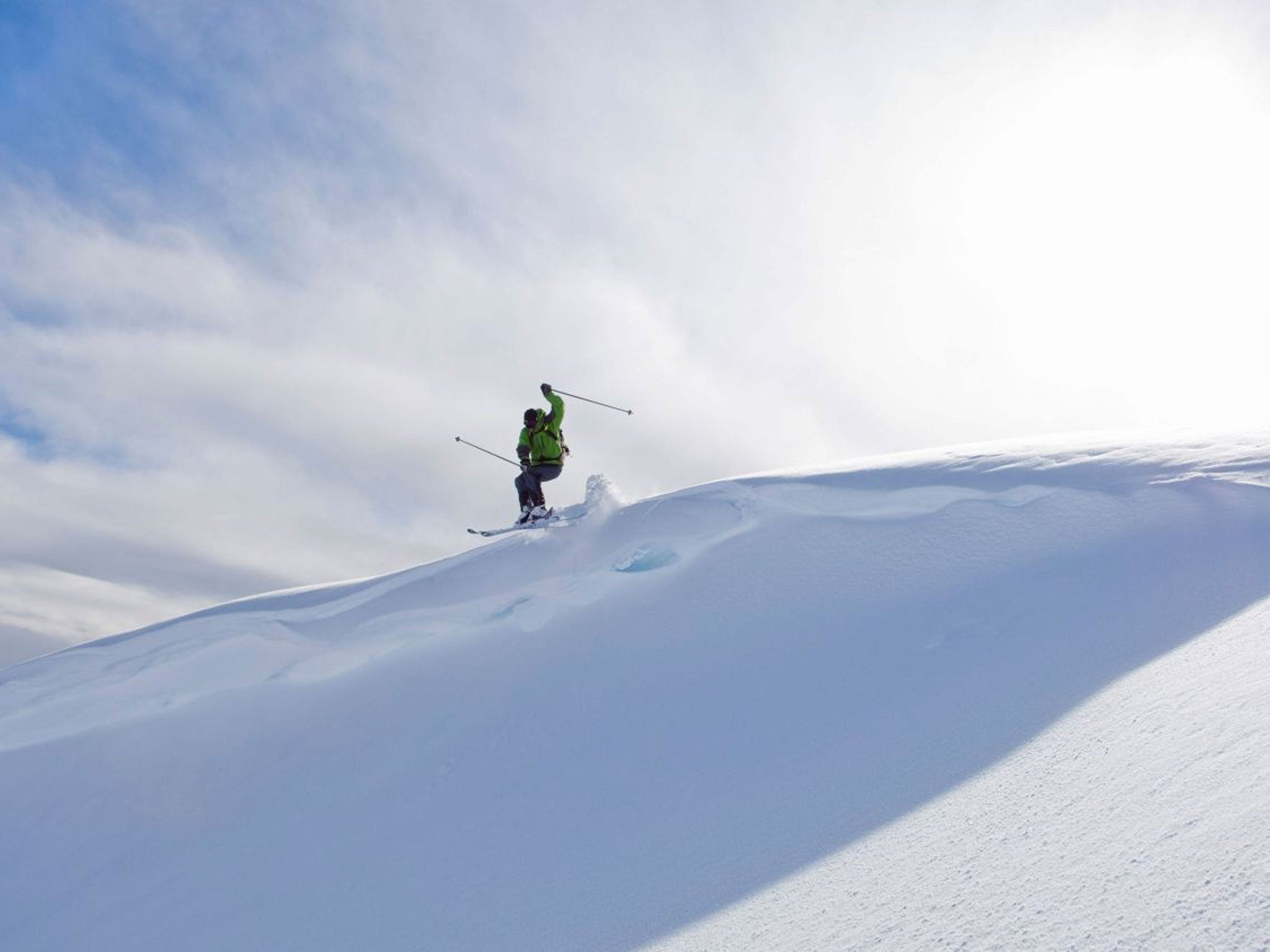 A skier flies through the air