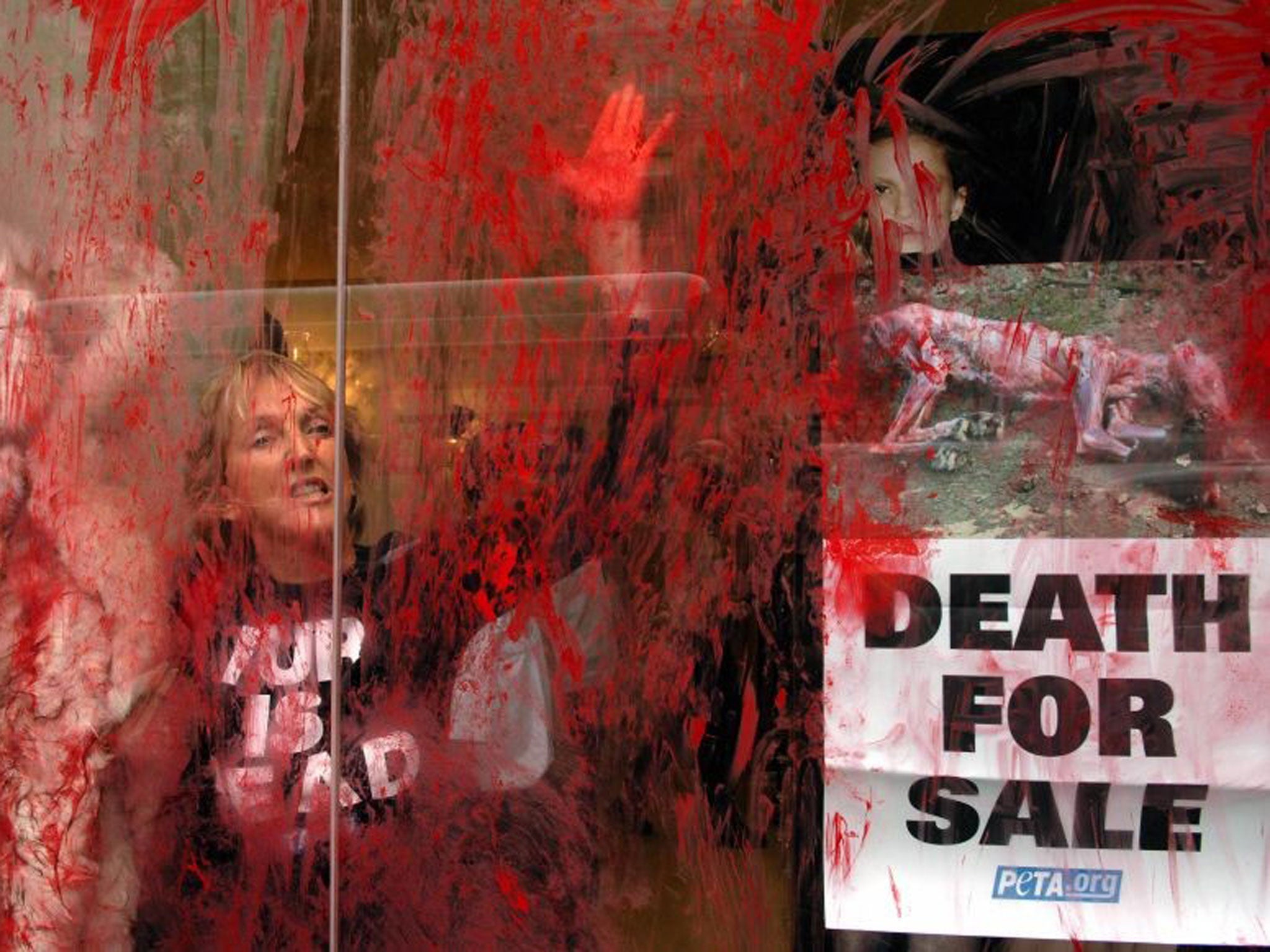 Peta's leader protesting against fur in Paris in 2006