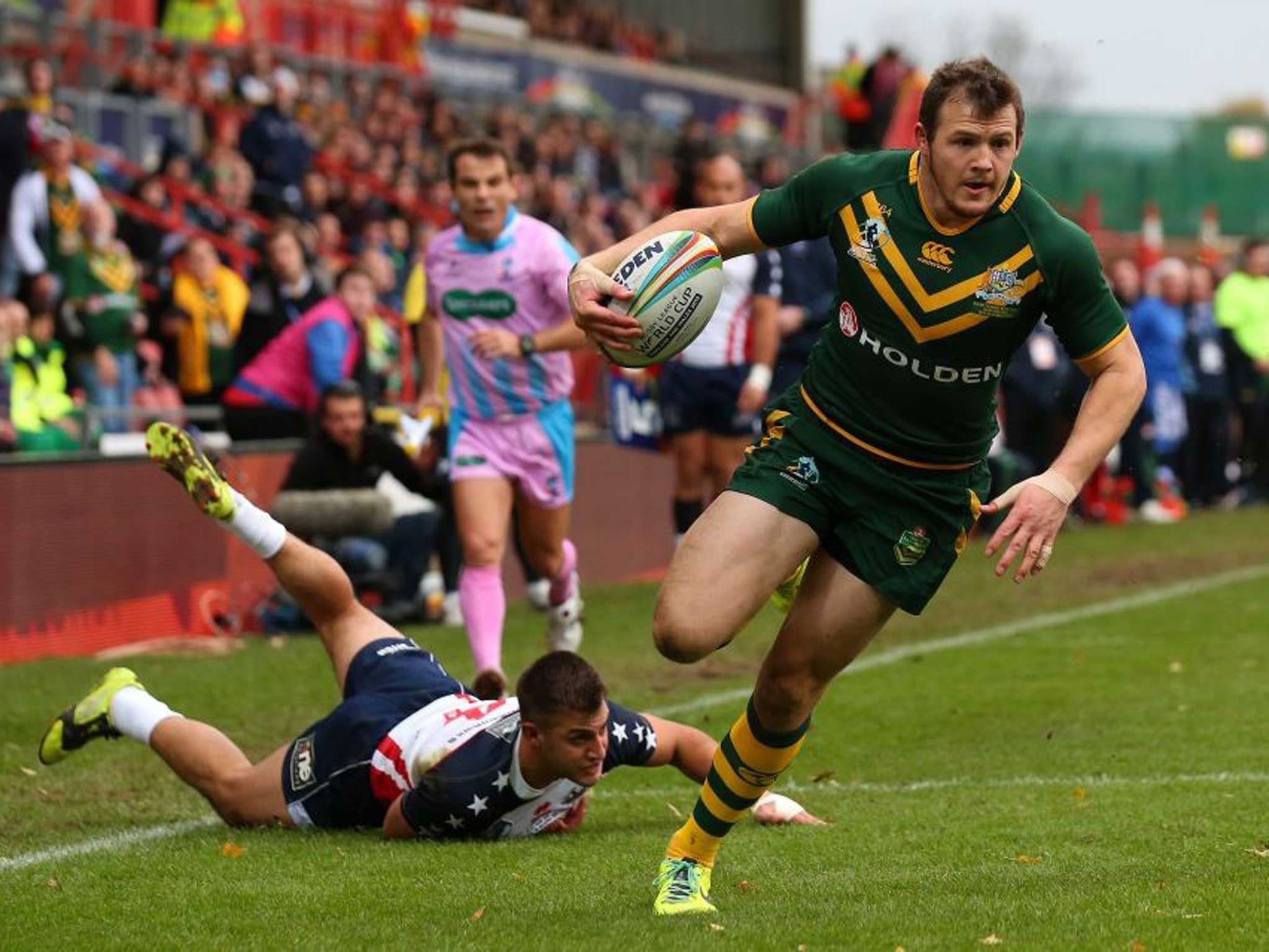 Morris dance: Brett Morris evades USA’s Michael Garvey for his third try