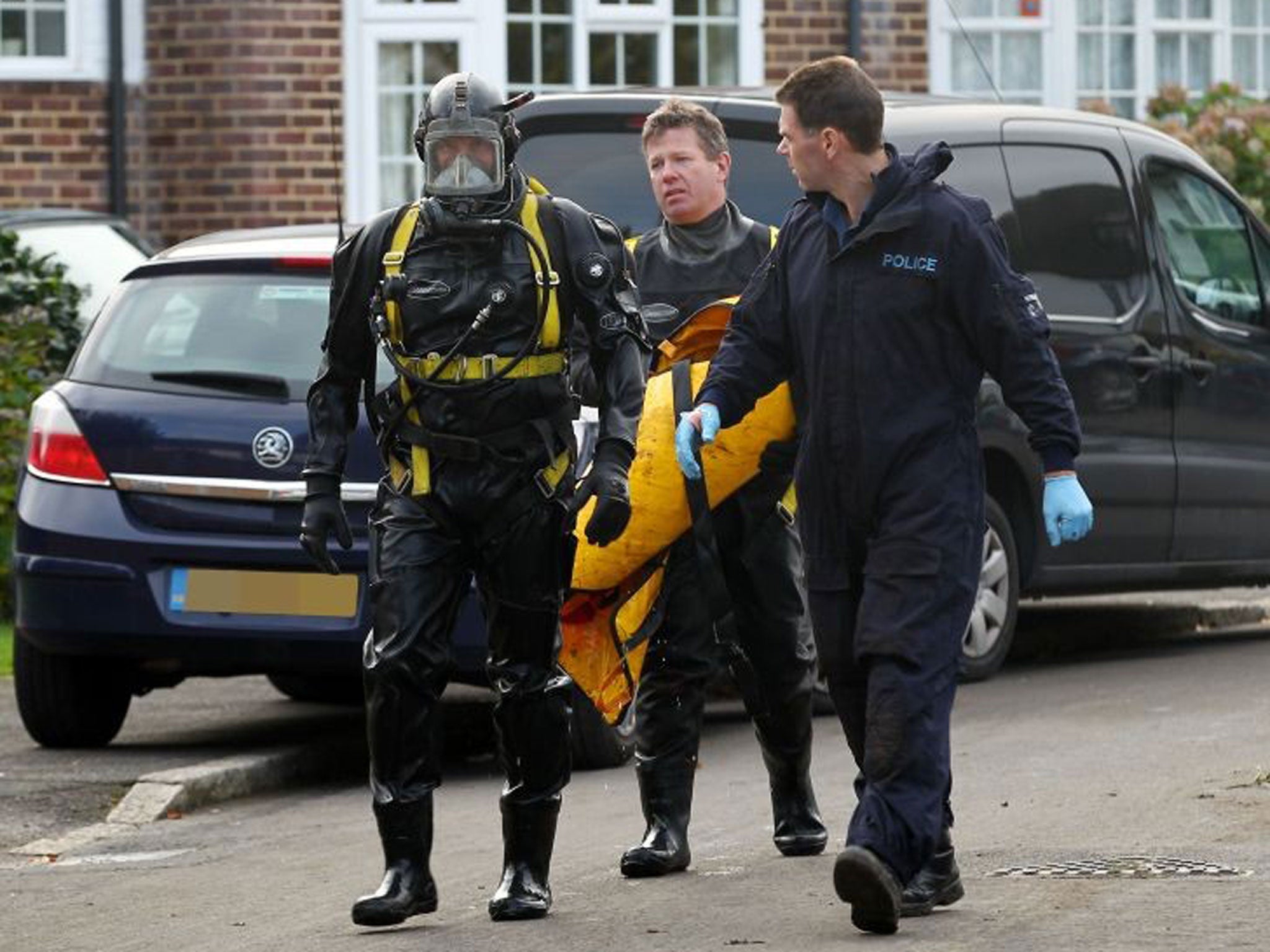 Officers from the Underwater and Confined Space Search Team during the recovery operation of a body that was discovered in a well in Surrey