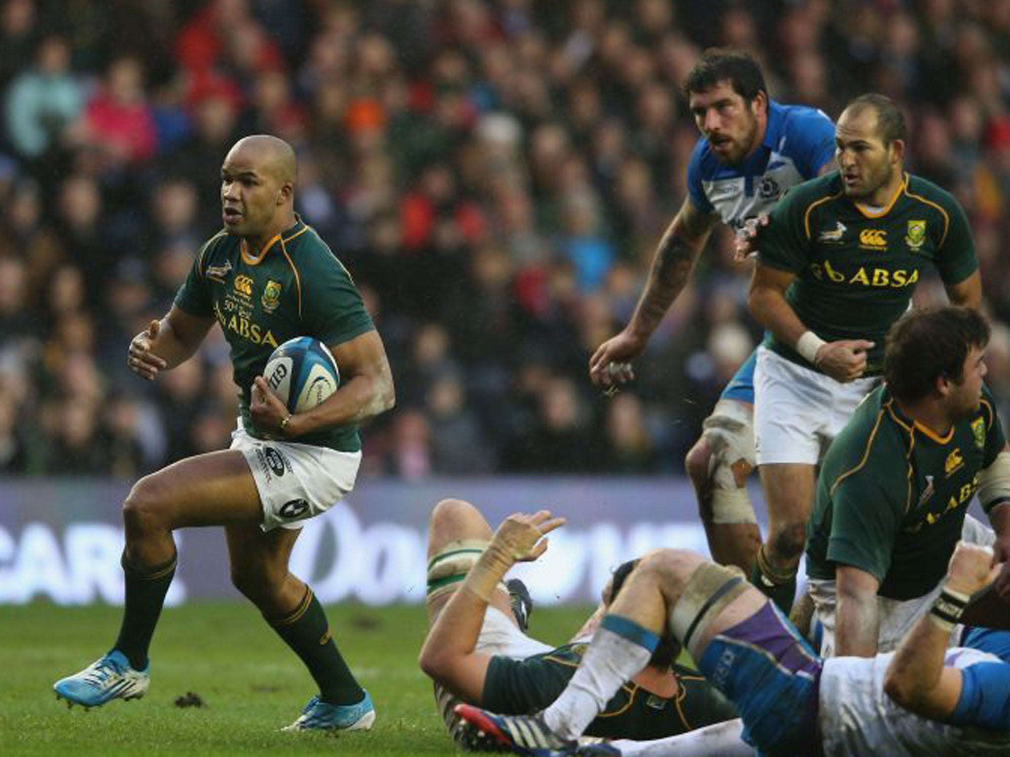 JP Pietersen of South Africa charges upfield in the 28-0 victory over Scotland