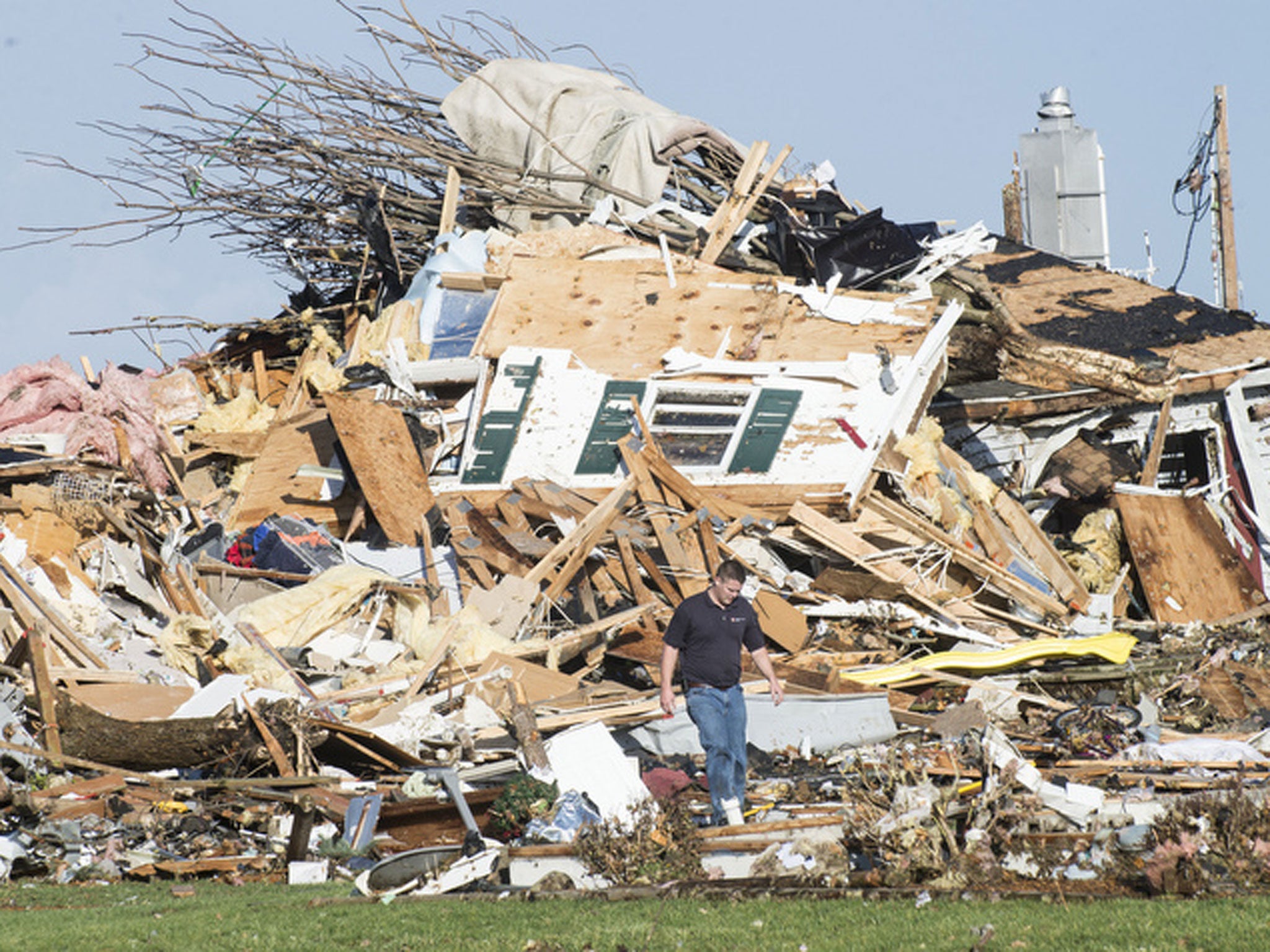 A series of tornadoes sweeping across Illinois and Indiana have killed at least two people and injured at least 40 while flattening large parts of the city of Washington in Illinois