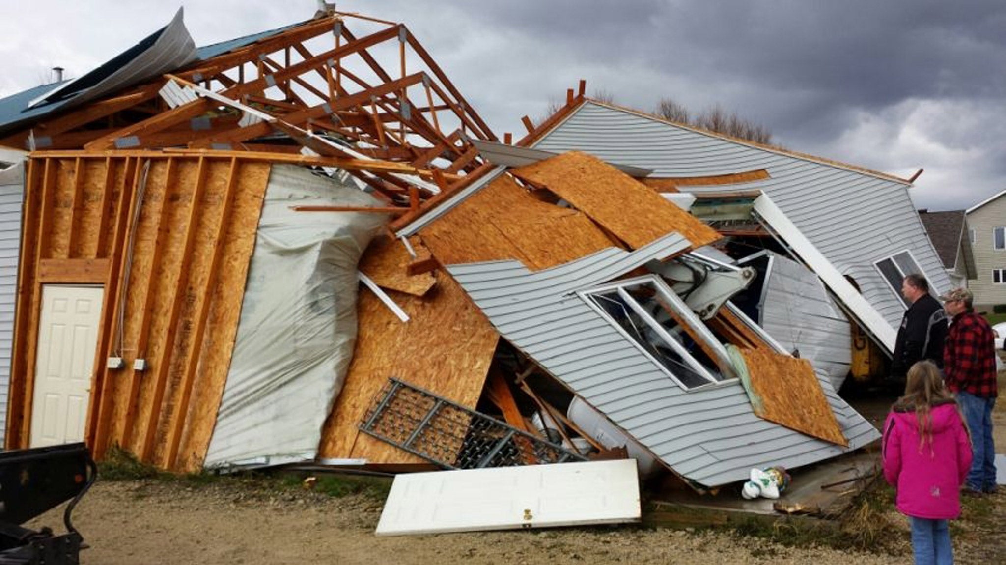 A garage in the Town of Hustisford collapsed and walls were turned inside-out after severe weather moved through the area yesterday