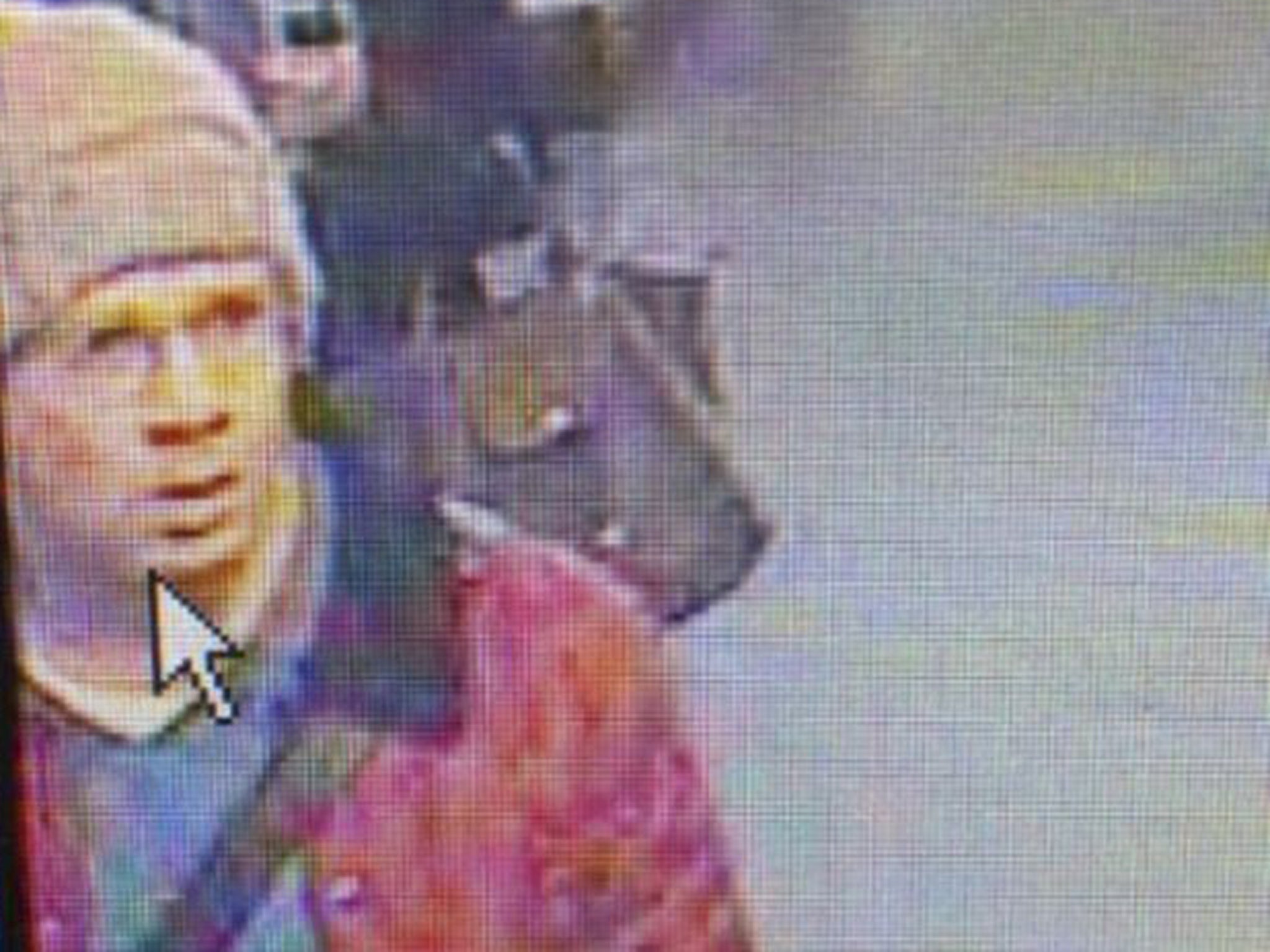 New CCTV image of suspect shows him wearing a red jacket, blue jumper and a fawn bonnet – a change of clothes from the khaki jacket worn when he attacked newspaper