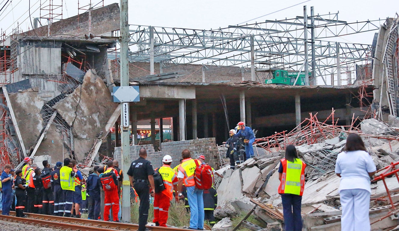 Rescuers search for construction workers still unaccounted for under the rubble at the Tongaat Mall