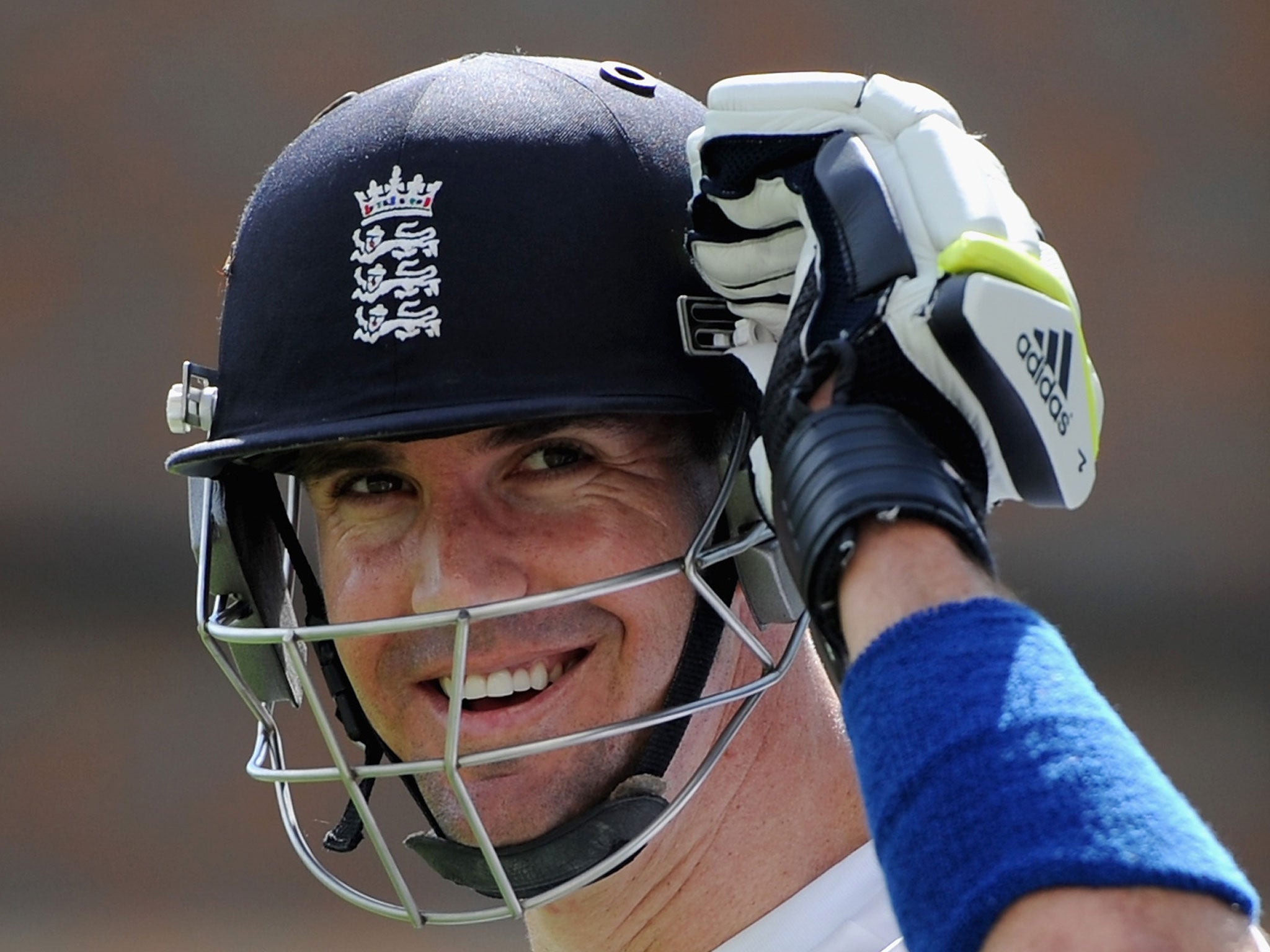 Kevin Pietersen is all smiles at The Gabba yesterday ahead of the first Ashes Test