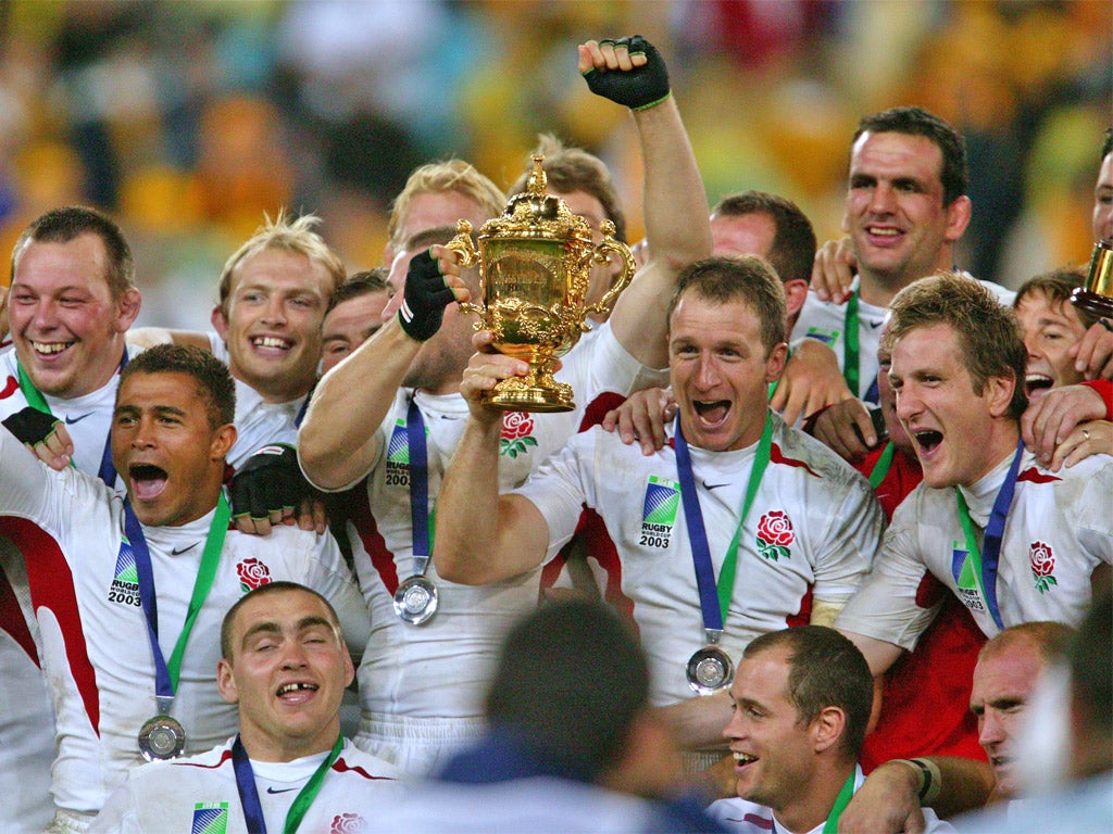 England's heroes celebrate with the Webb Ellis trophy