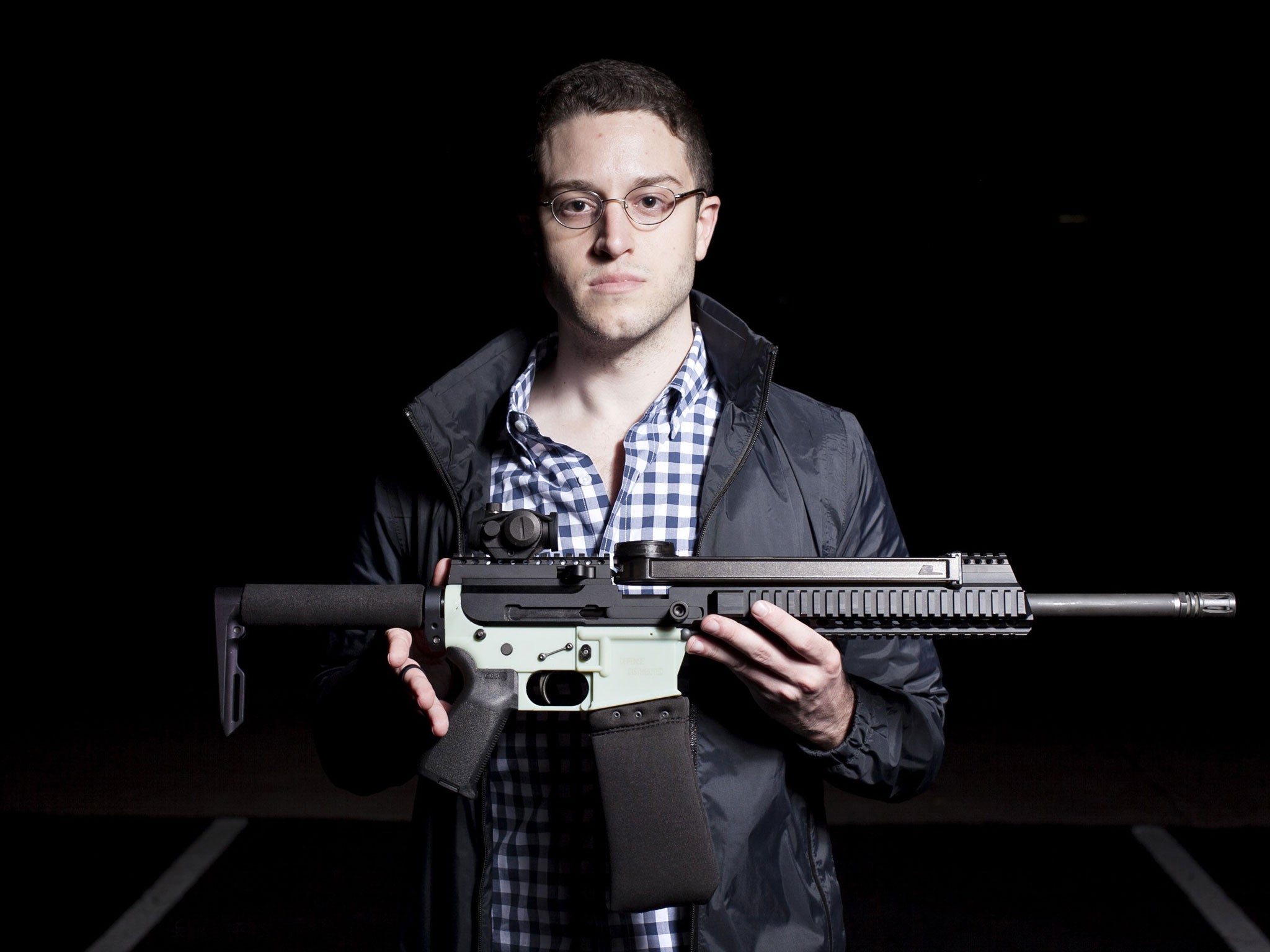 The gift that keeps on giving: Cody Wilson with an AR-15 gun. It has a 3D-printed lower receiver