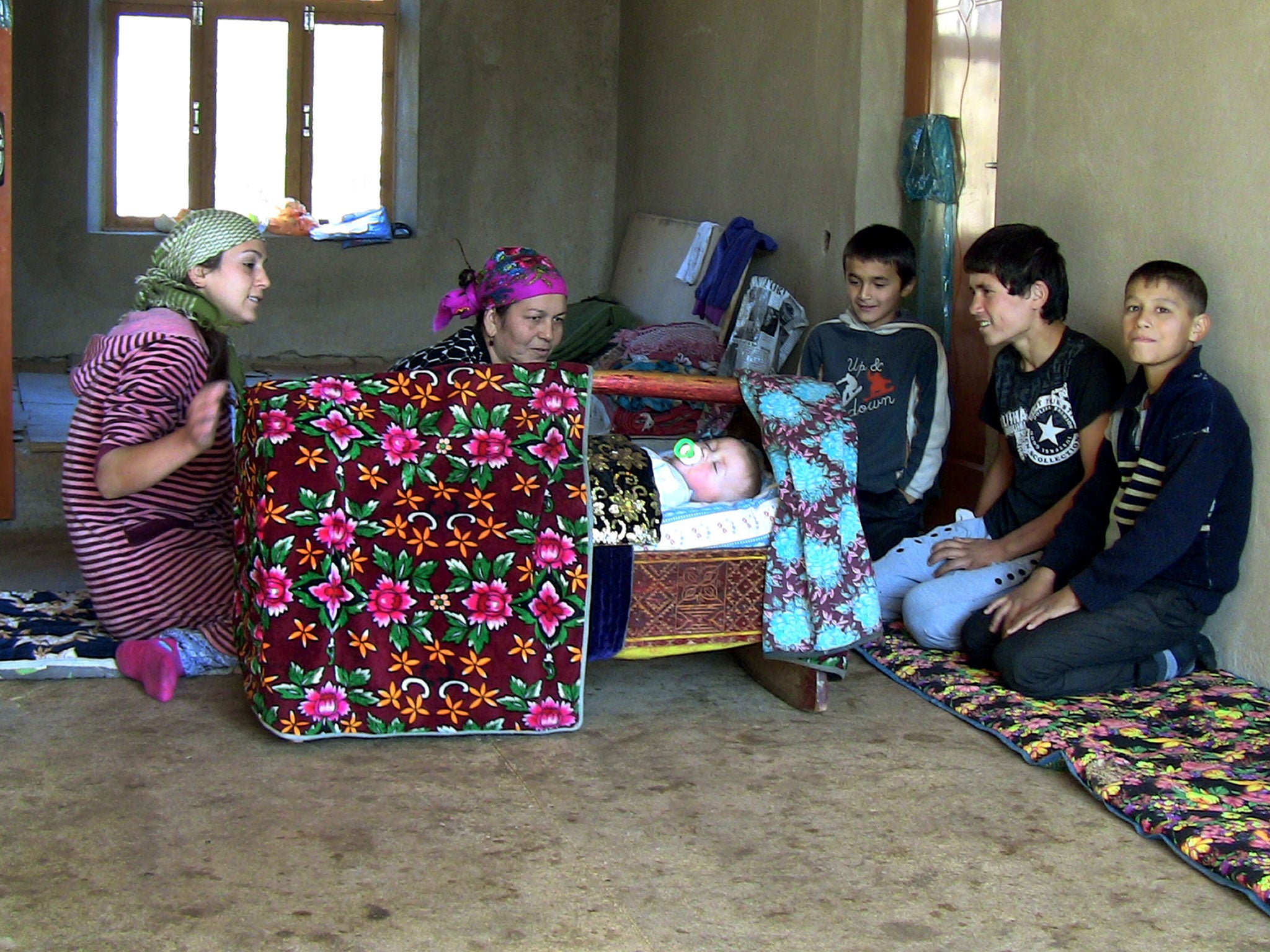 A migrant worke's family at their home in the Tajik capital Dushanbe