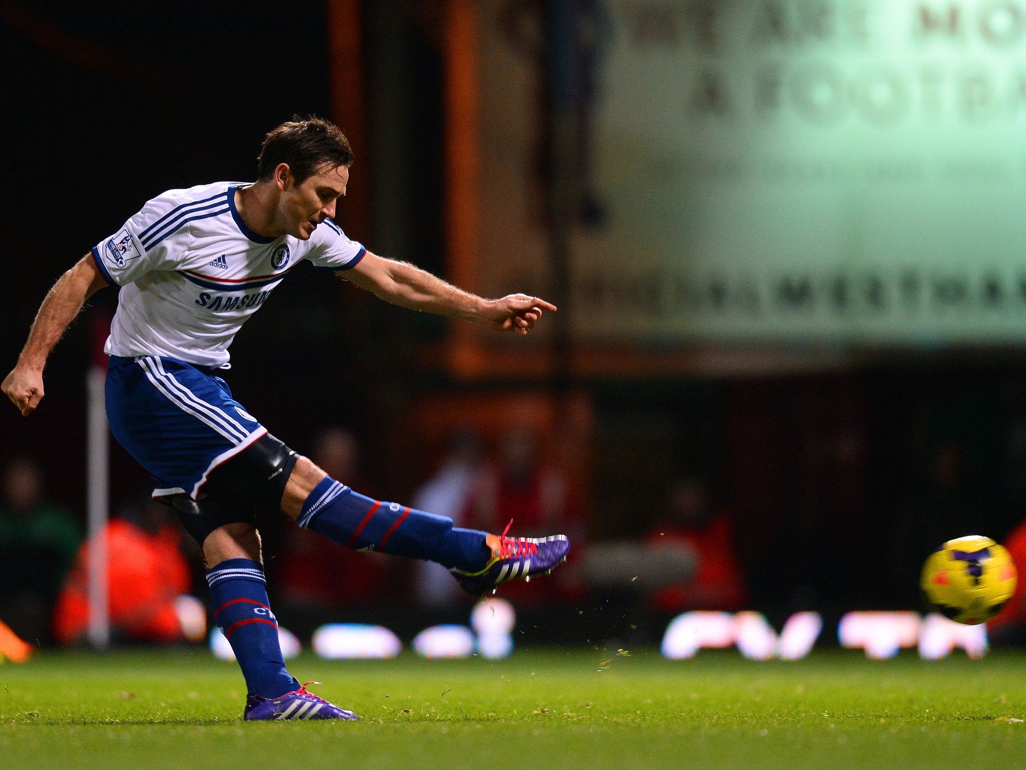 Frank Lampard of Chelsea scores the opening goal from the penalty spot