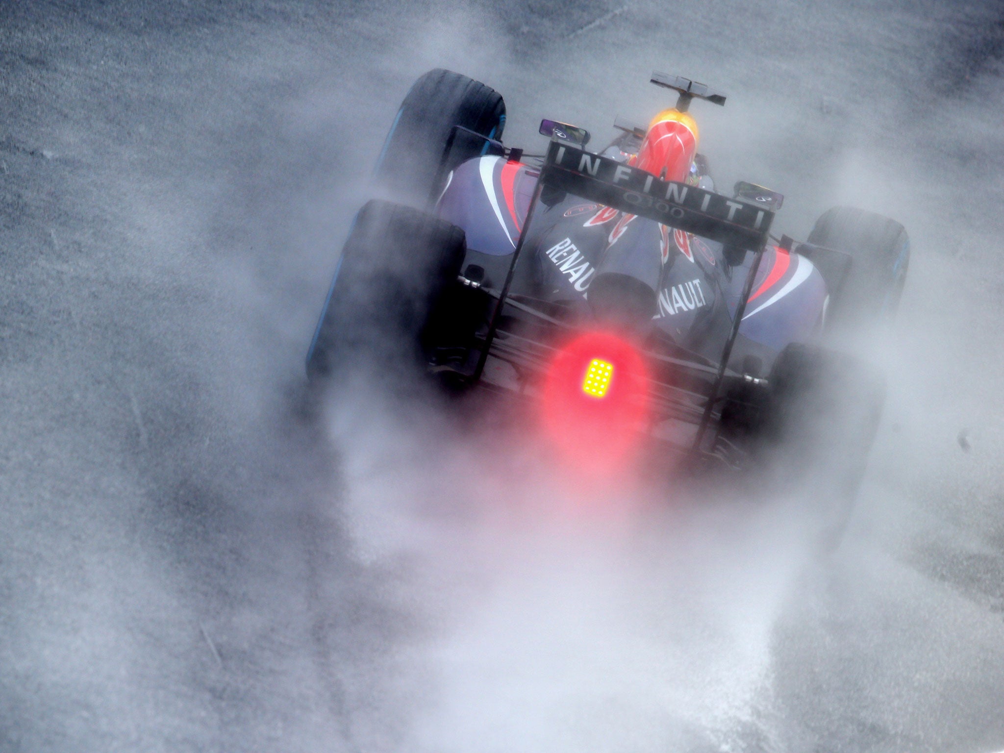 Sebastian Vettel of Germany and Infiniti Red Bull Racing drives on his way to finishing first