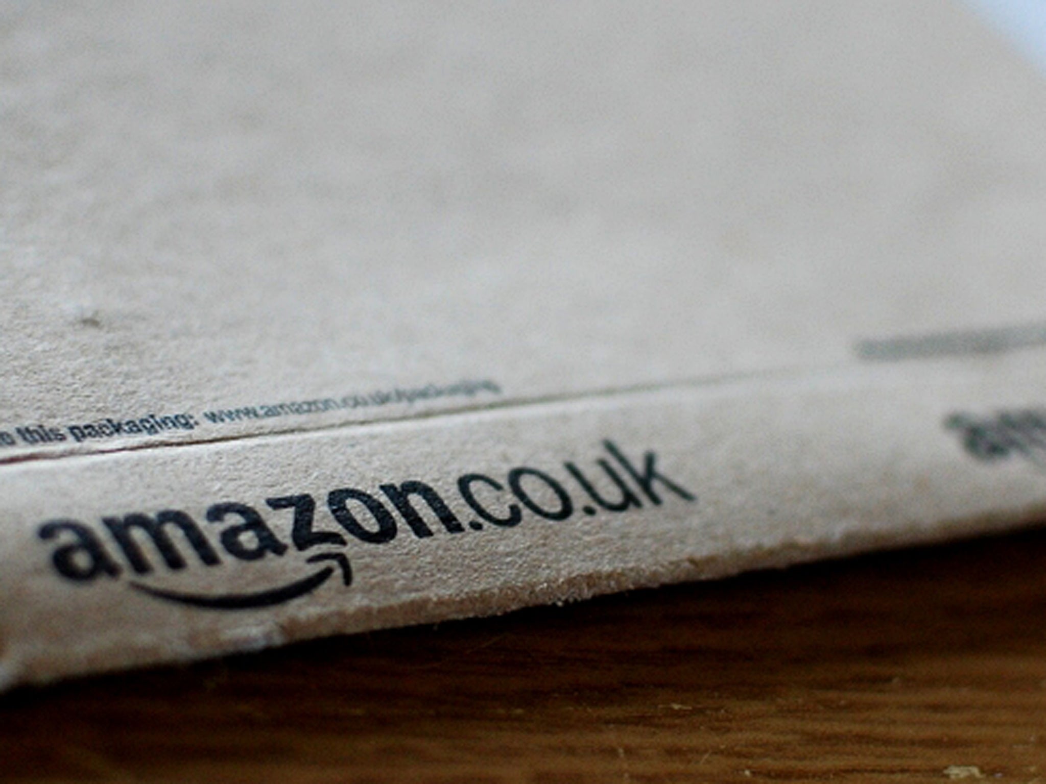 Amazon is to take on 15,000 extra staff for the Christmas period