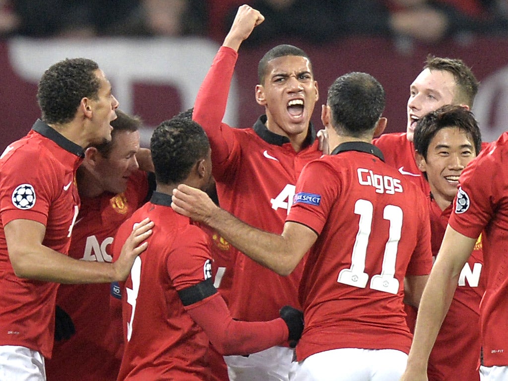 Chris Smalling celebrates a rare goal with his teammates