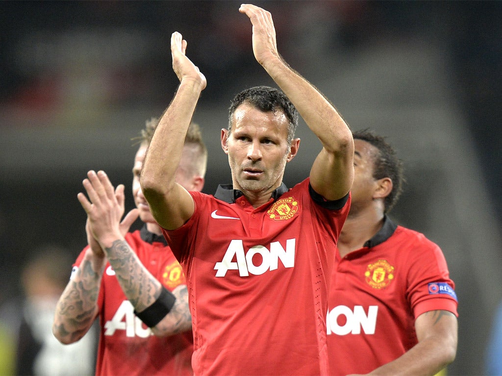 Ryan Giggs applauds the Manchester United away fans