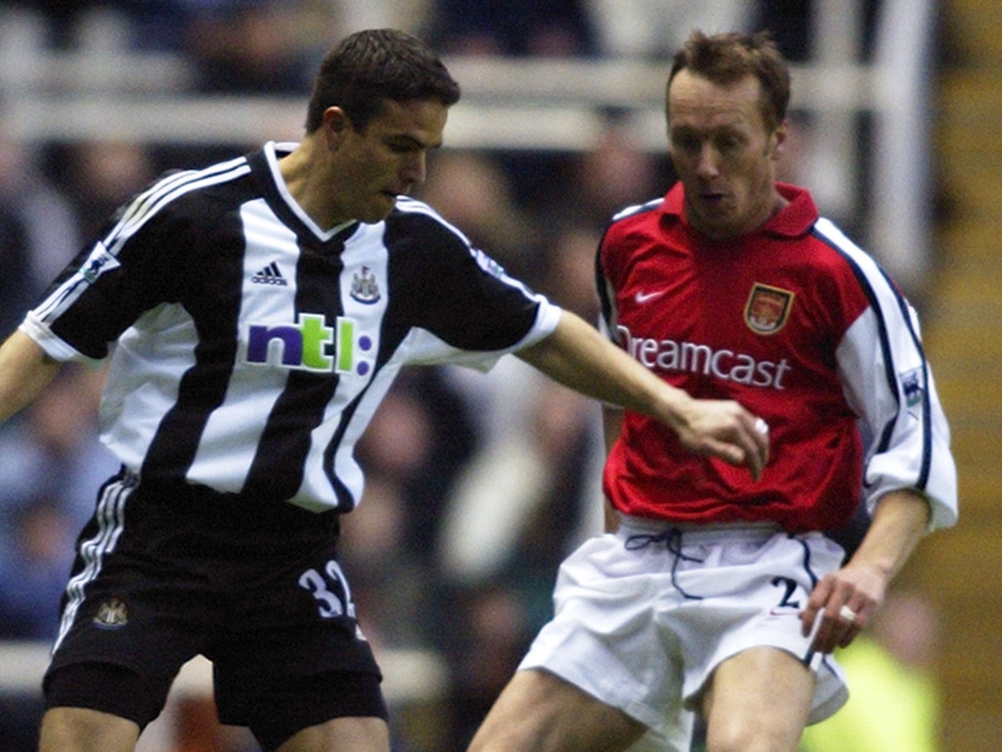 Lee Dixon (right) and his rolled up sleeves in 2002