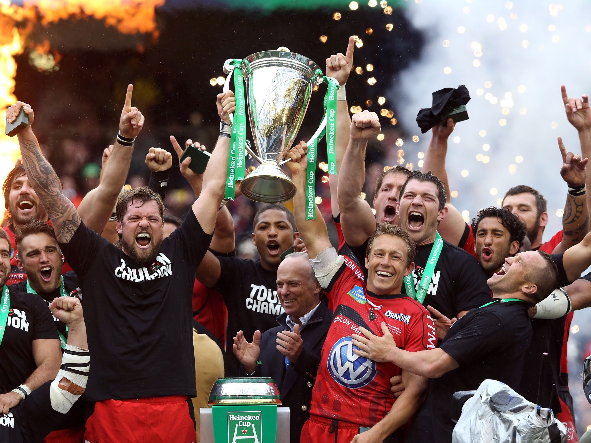 Jonny Wilkinson (in red) and his Toulon team-mates hoist aloft the Heineken Cup after victory over Clermont Auvergne back in May