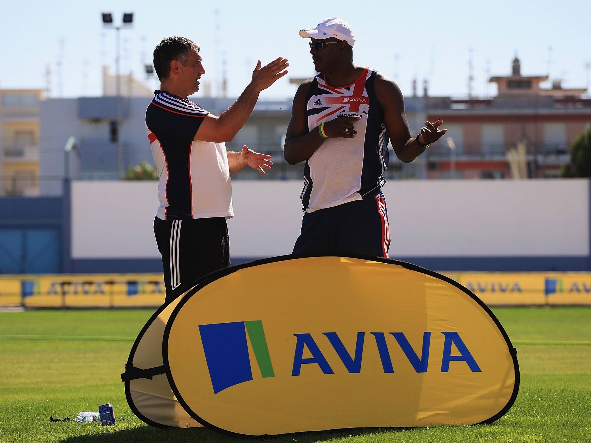 Lloyd Cowan (right) speaks with Toni Minichiello, coach of Jessica Ennis-Hill