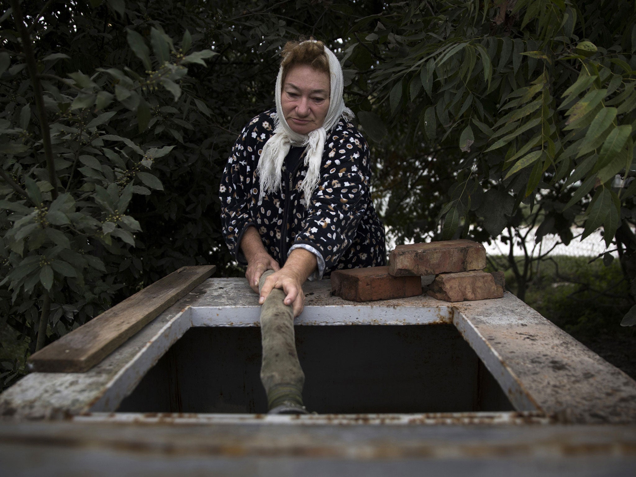 Tatyana Velikaya says she is forced to walk four miles to find clean water since the Games building began