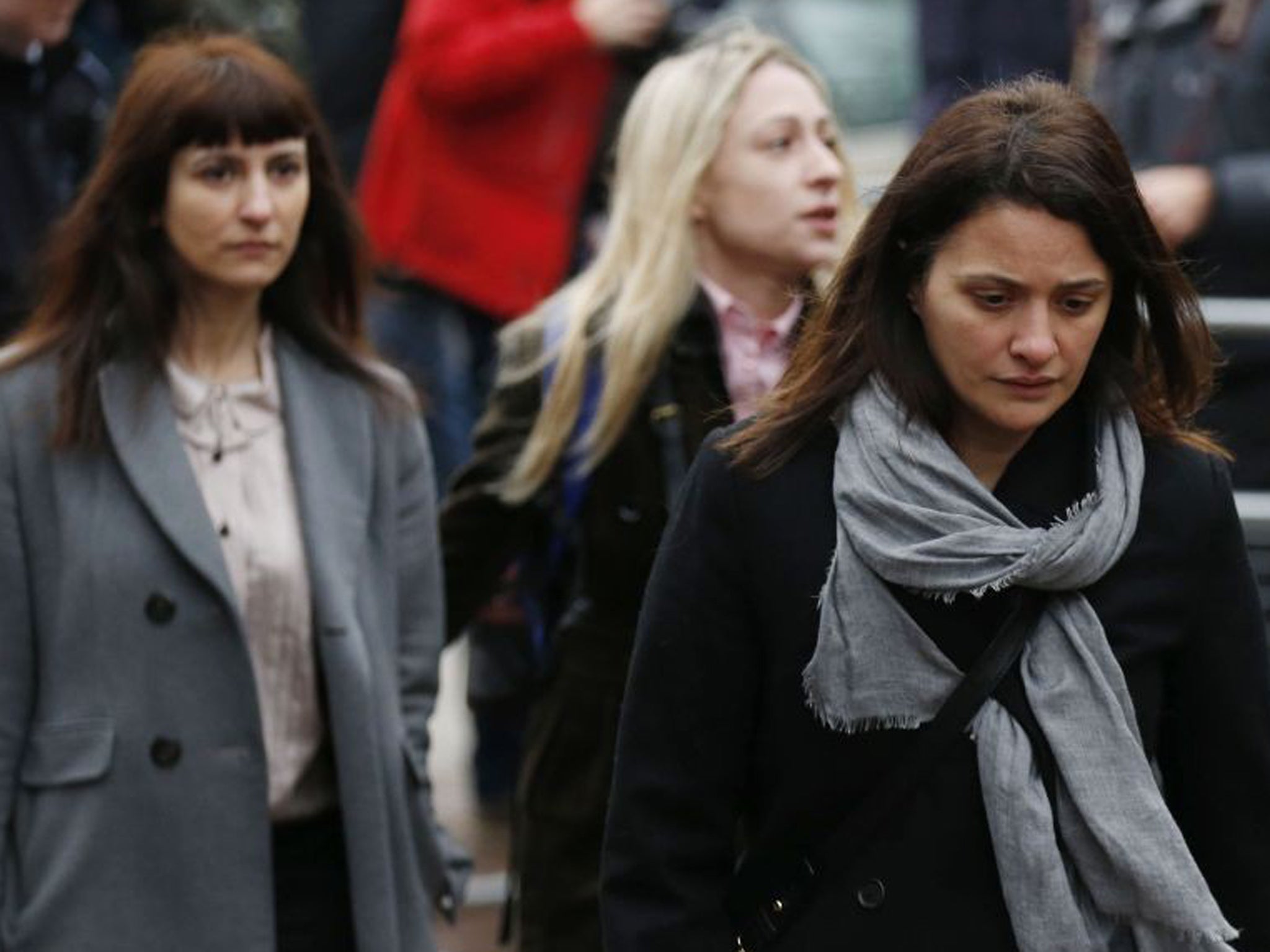 Elisabetta Grillo, foreground, and Francesca Grillo, left, are accused of abusing their positions by using credit cards loaned to them by Ms Lawson and her former husband Charles Saatchi