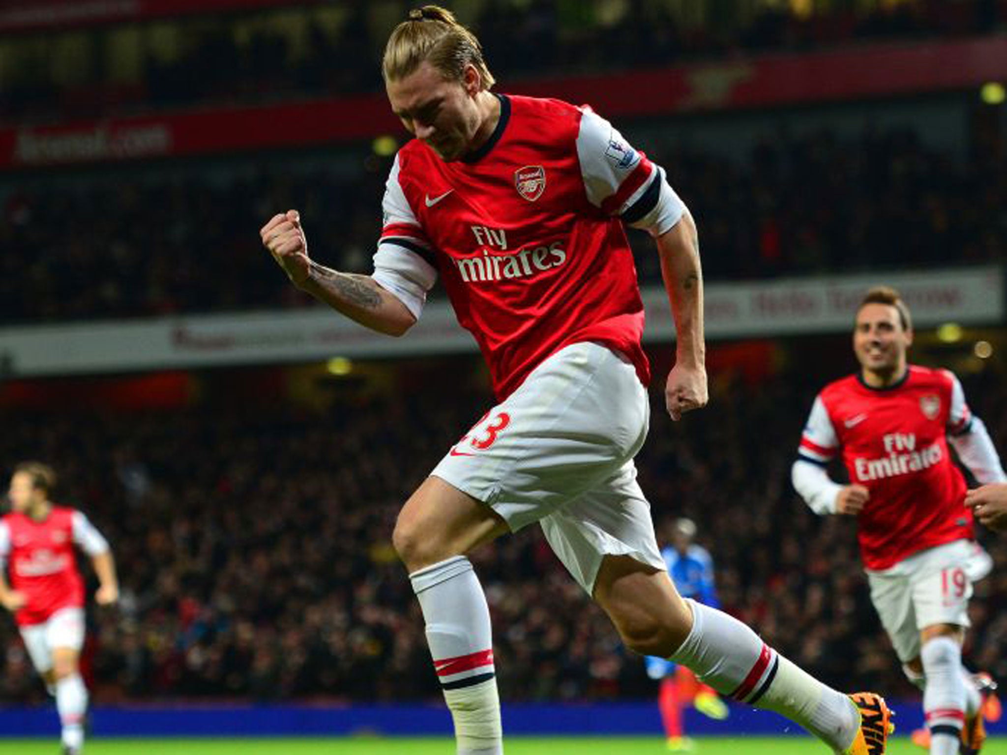 Nicklas Bendtner celebrates the opening goal