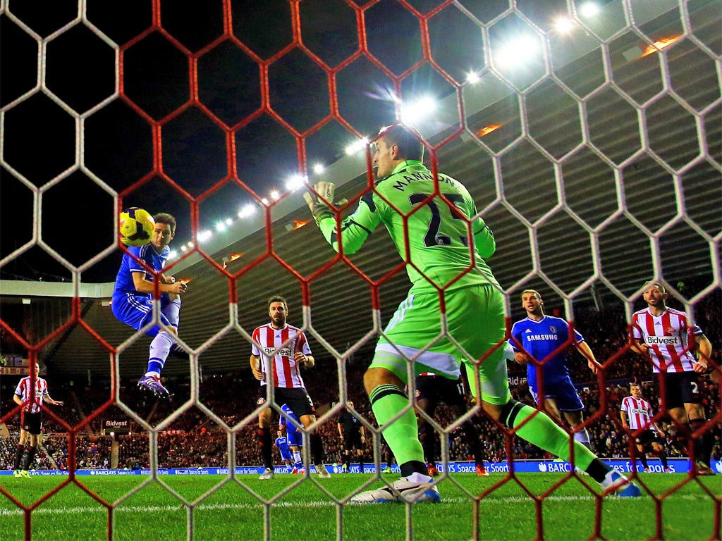 Frank Lampard uses his head to score Chelsea's first