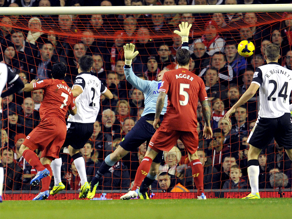 Suarez watches as Ruddy fails to prevent his second