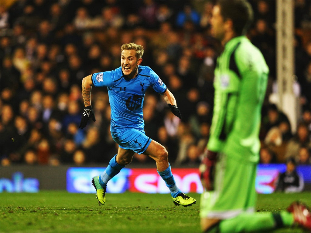 Tottenham's Lewis Holtby celebrates his winner, as Maarten Stekelenburg sinks to his knees