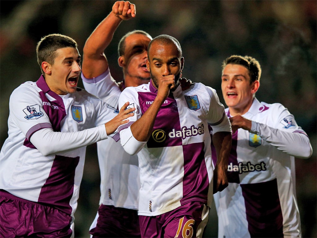 Fabio Delph celebrates his late winner with teammates