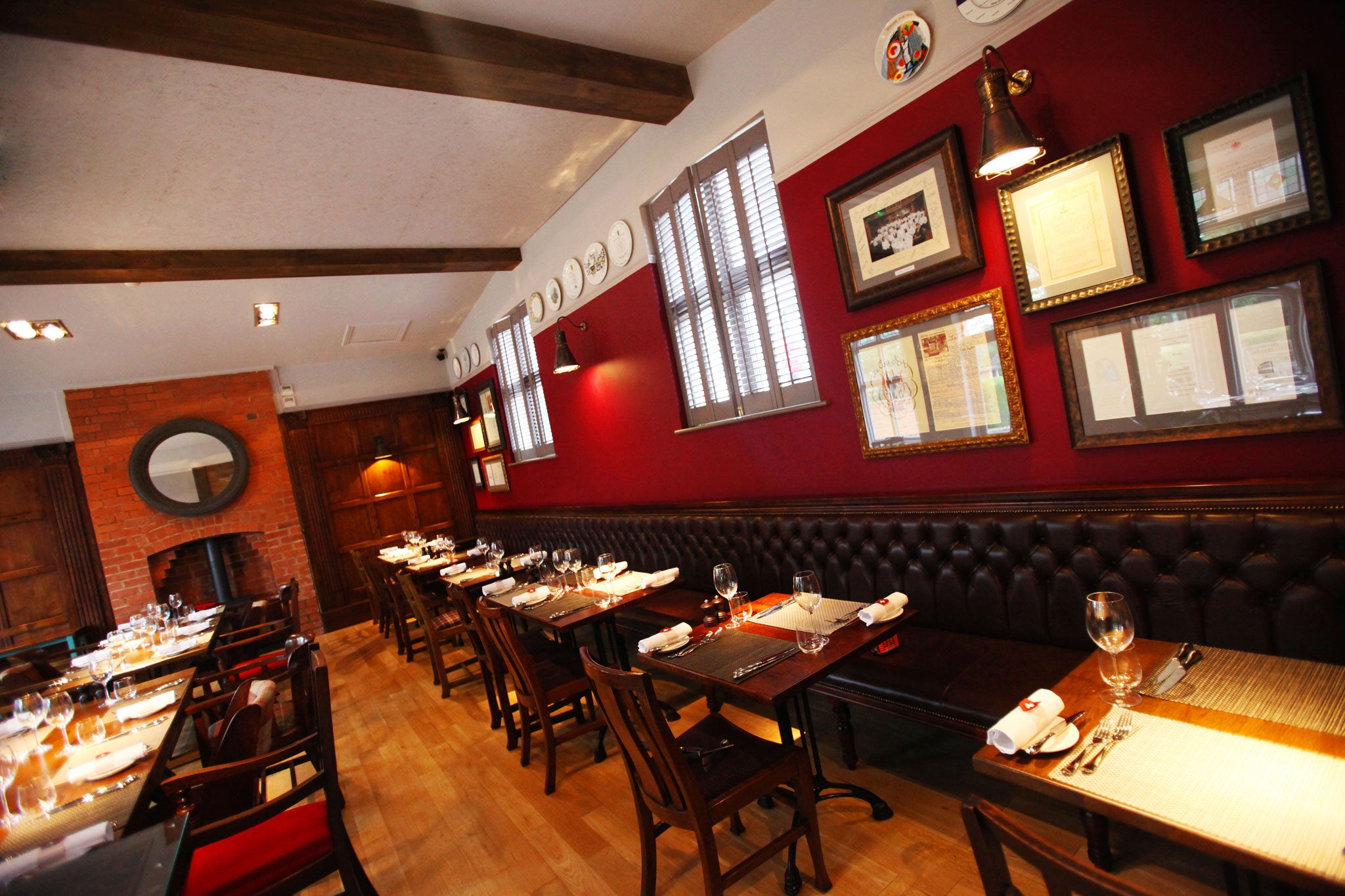 Ancient beams have been exposed and baronial wood-panelling restored