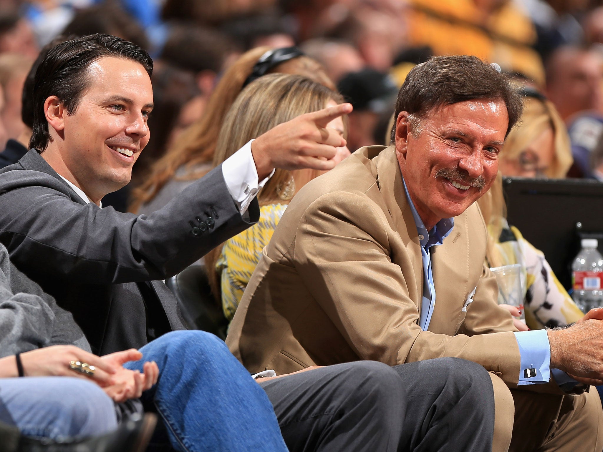 Arsenal latest addition to the board of directors, Josh Kroenke (L) sits alongside his father and Arsenal majority shareholder Stan Kroenke (R)