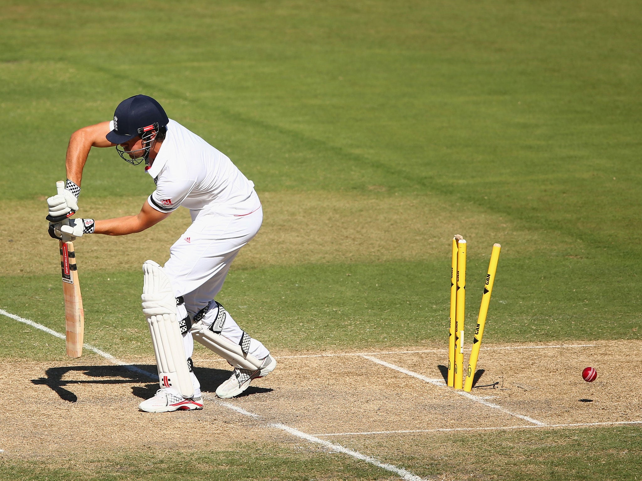 Alastair Cook is bowled by Mitchell Johnson in the Second Test of the Ashes series