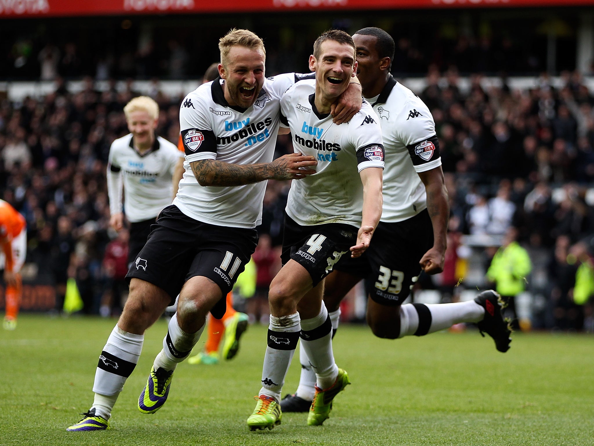 Derby County celebrate after Chris Bryson scores