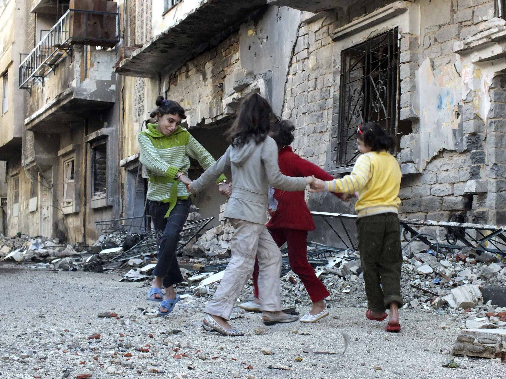 One insurgent group linked to al-Qa’ida hopes to gain support in Syrian communities torn apart by two years of civil war by distributing aid and setting up its own schools and courts