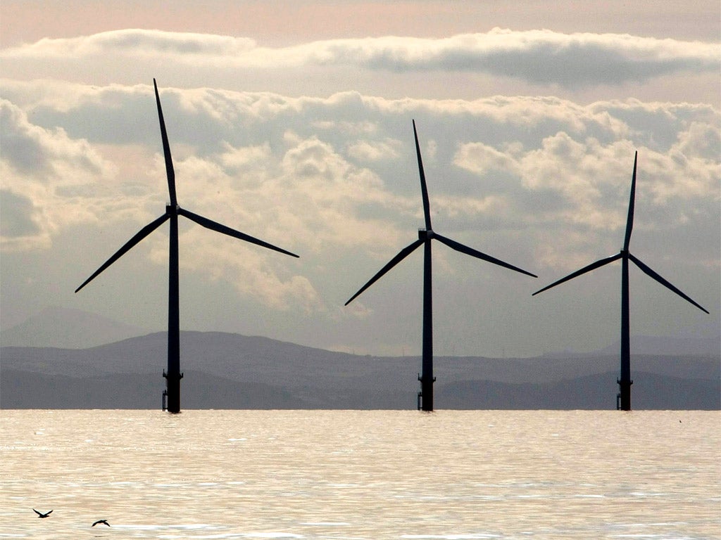 Turbines of the Burbo Bank off shore wind farm adorn the skyline in the mouth of the River Mersey (Getty)