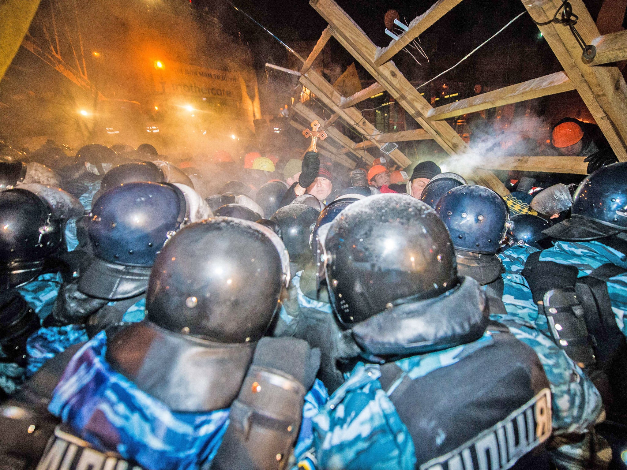 Thousands of riot police were forced to withdraw