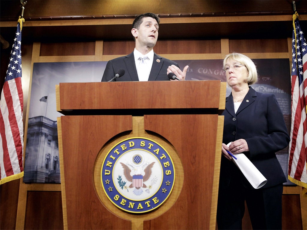 House Budget Committee Chairman Paul Ryan speaks at a press conference to announce the Bipartisan Budget Act of 2013