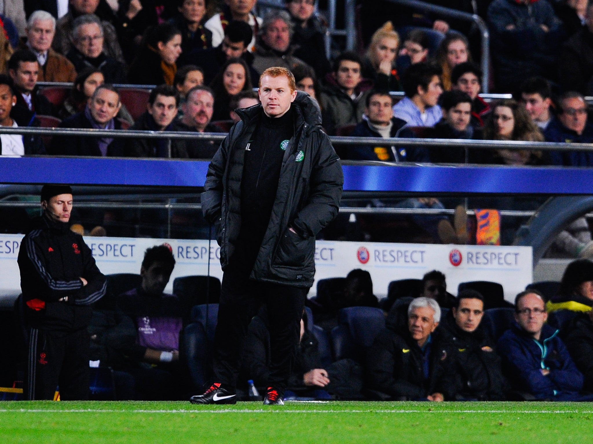 Celtic manager Neil Lennon watches on as his side slump to a 6-1 defeat at Barcelona