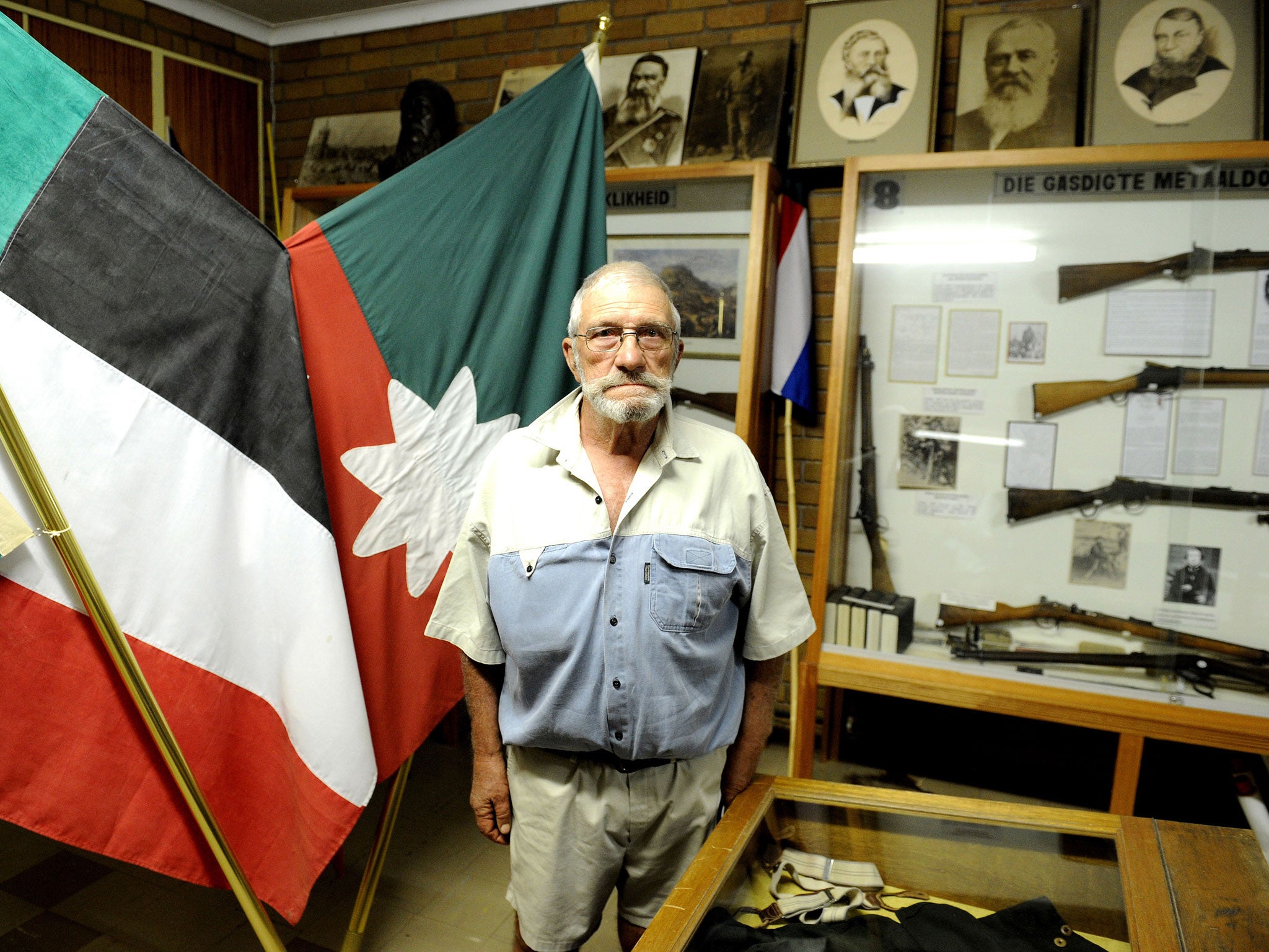 Gideon de Kock with Afrikaner flags in the town museum